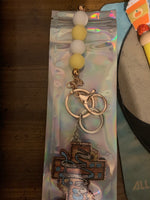 Yellow white cross key chain