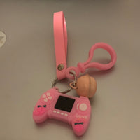 Pink game boy key chain