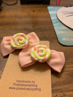 pink swirl bow adult or child  set of two