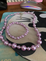 pink pearl bracelet and necklace