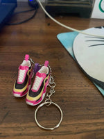 key chain  pink and yellow runner